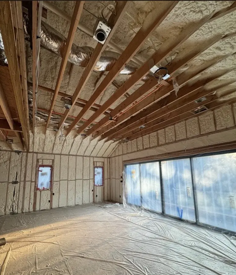 Interior walls and ceiling insulated with spray foam during new construction in Northlake